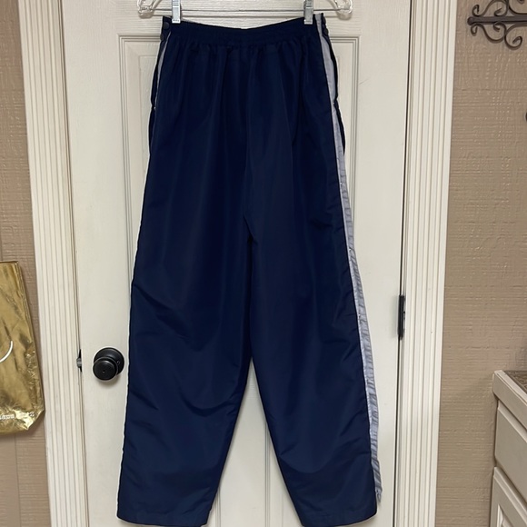 Vintage Starter Full-Snap
Breakaway Tear Away pants. Size medium. Navy and gray - Picture 9 of 14